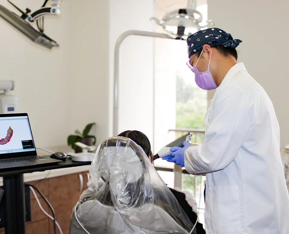 Dr. Zhang with a patient at Fullerton Smile Dentistry